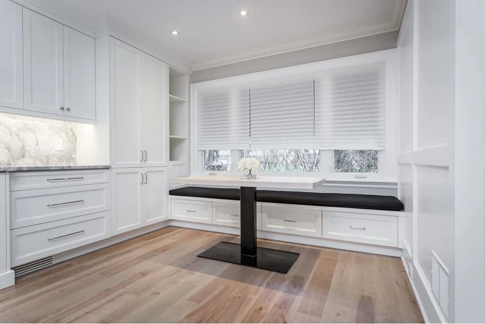 Fitted window seating and cabinetry